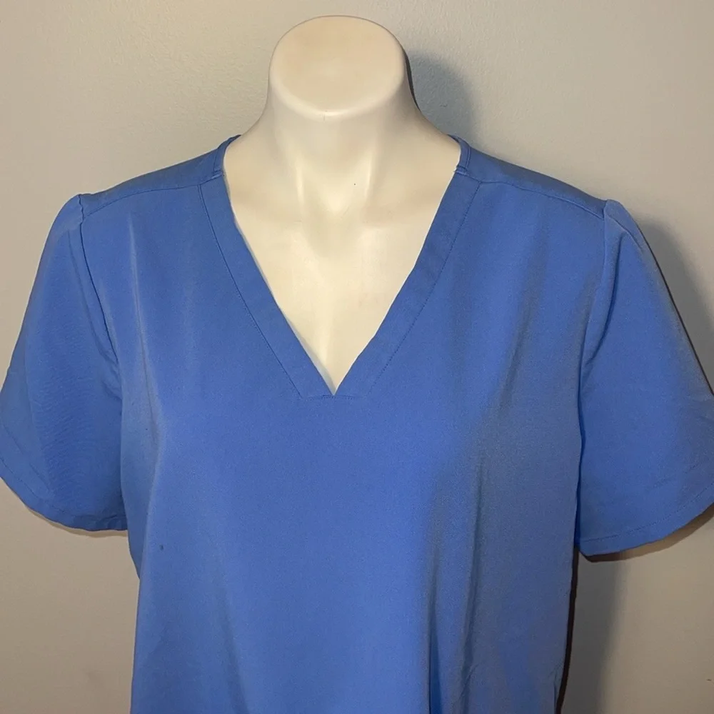 Figs Technical Collection ladies XL Light blue scrub top.